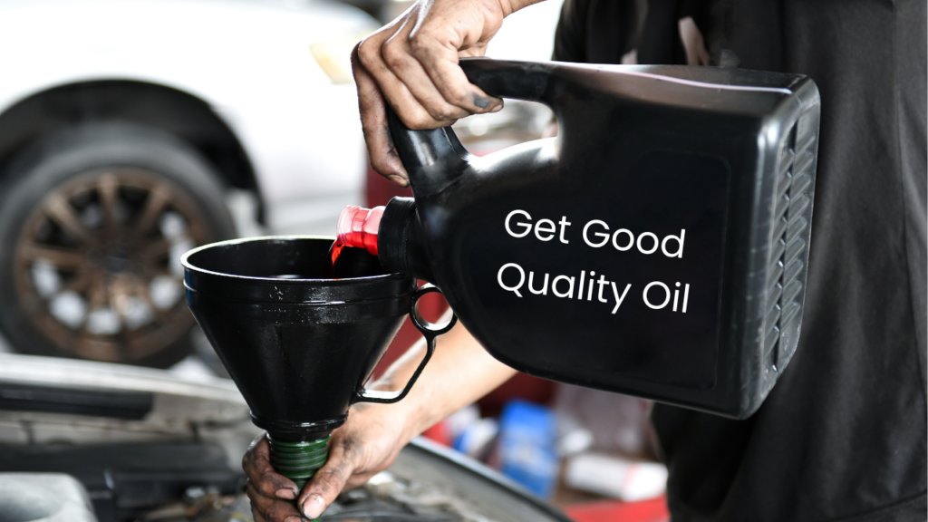 A person pouring new oil into a car engine for an oil change.