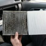 Dirty cabin air filter next to a new clean cabin air filter